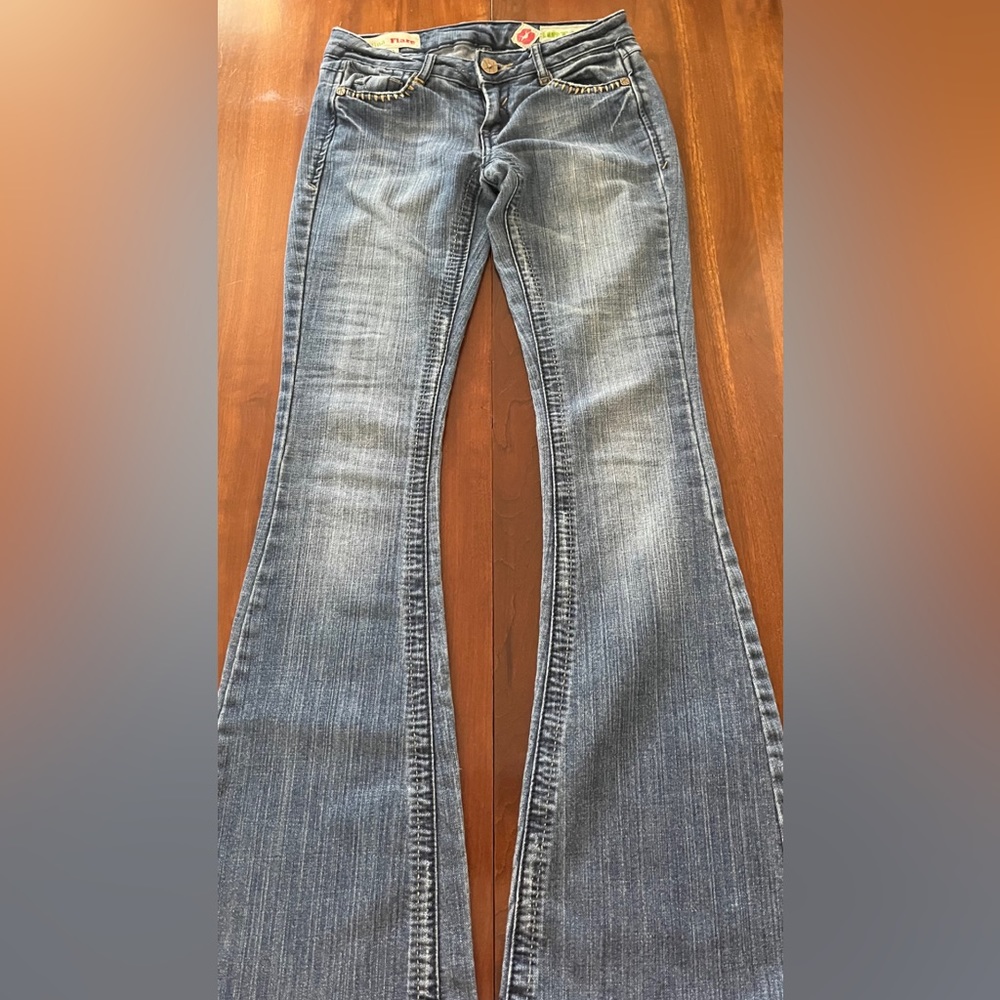 indigo flared jeans size 0, message me for measurements and i’ll let you know!